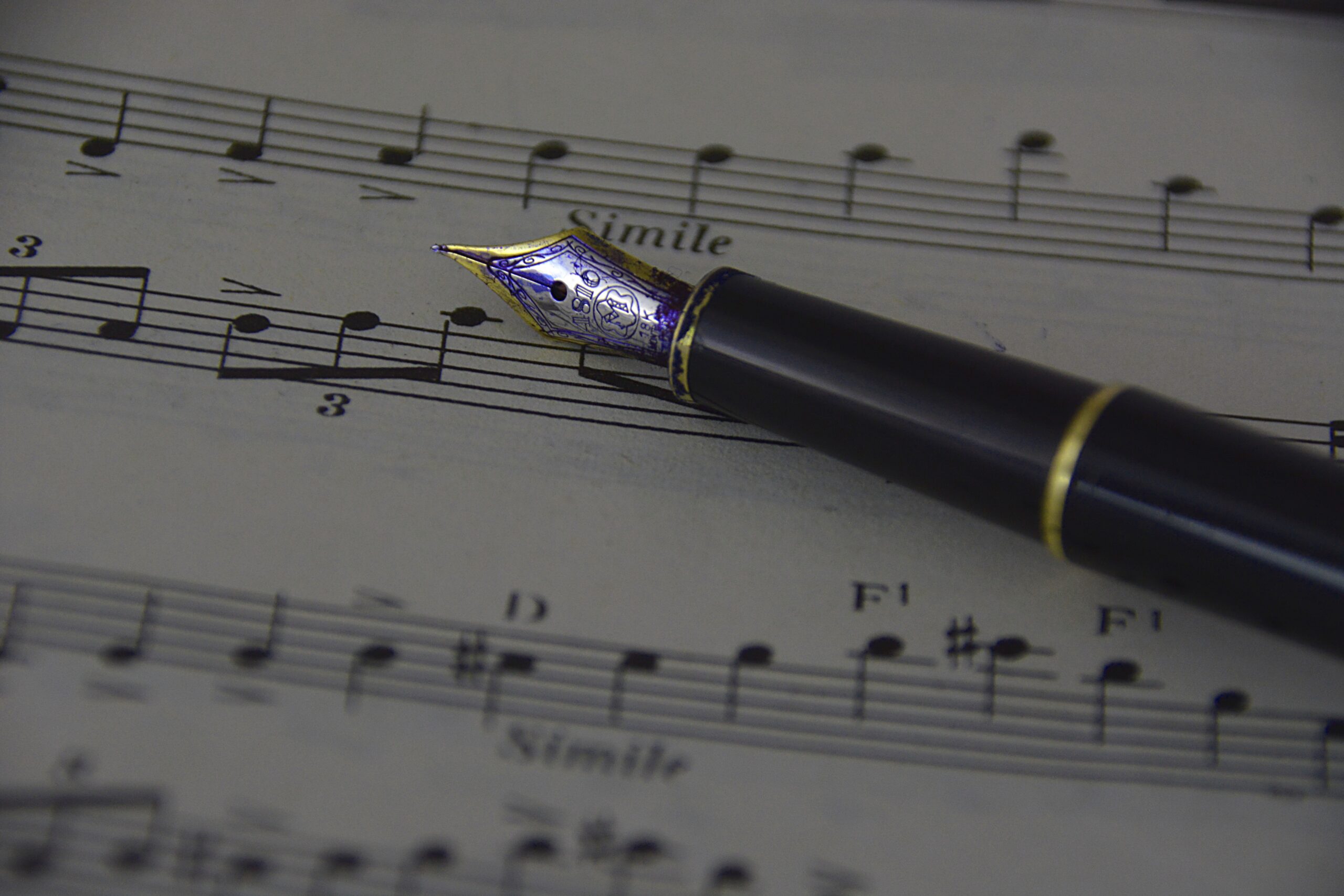The Rhythm of the Pen: The Difference Between Writing Copy and Composing It